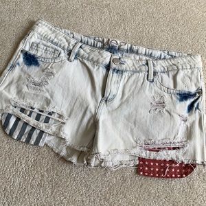 Distressed denim shorts